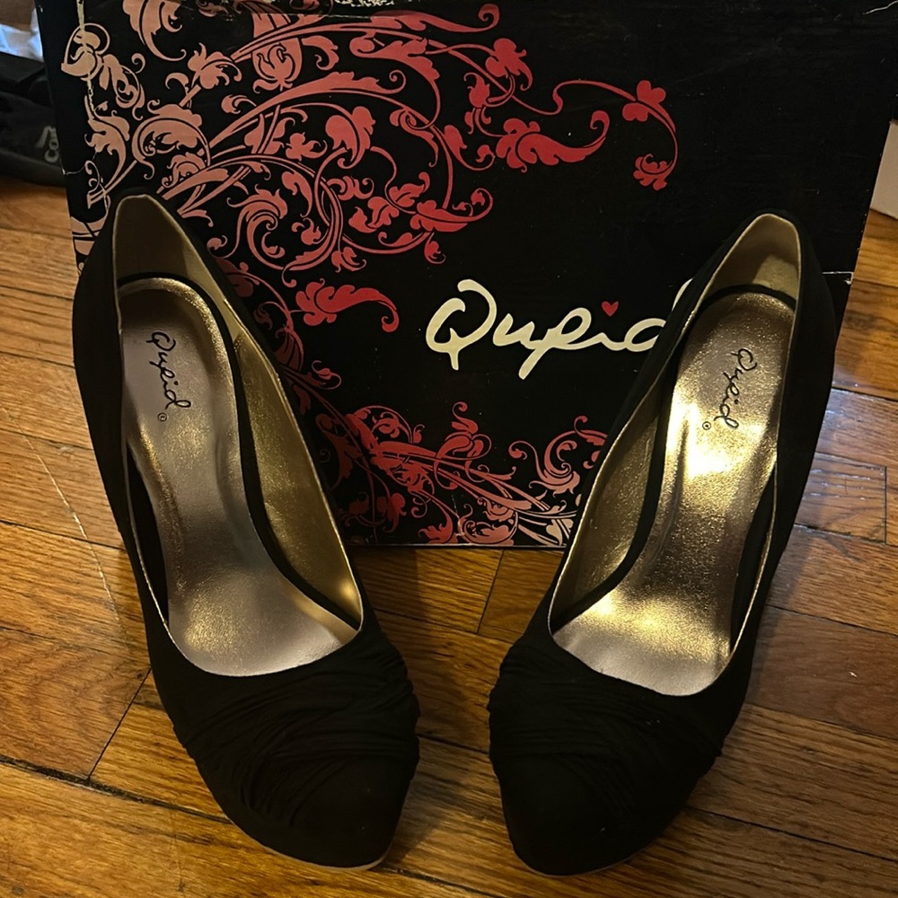 Black suede closed toe heels